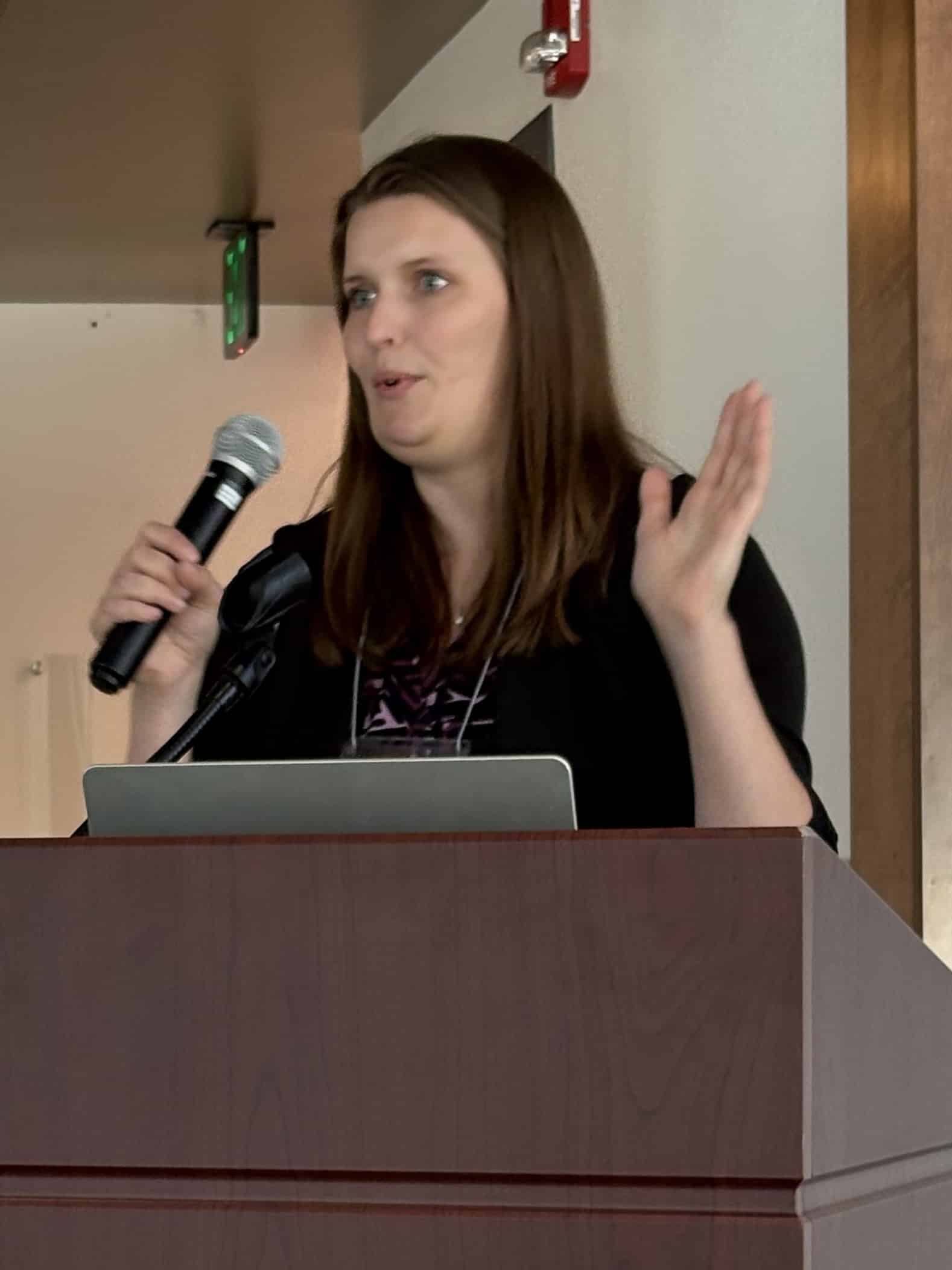 Julia Beck speaks on "Teaching Students with Hearing Loss" at the IMTF luncheon